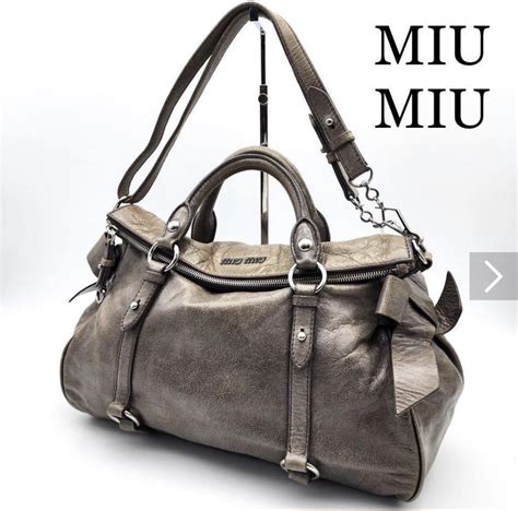 real real miu bow bag.